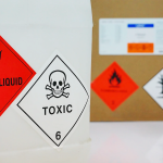 Chemical waste labels and stickers displayed on packaging