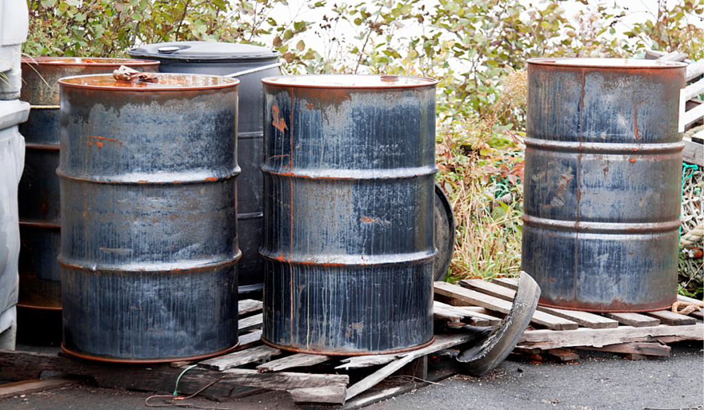 Aged metal barrels outside