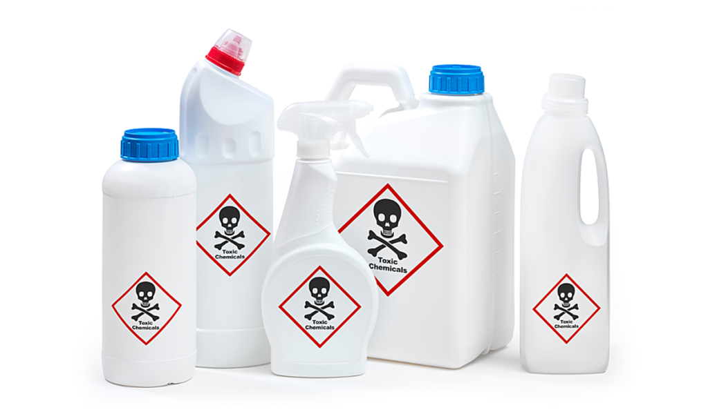 Containers of chemical waste labelled as toxic chemicals