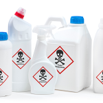 Containers of chemical waste labelled as toxic chemicals