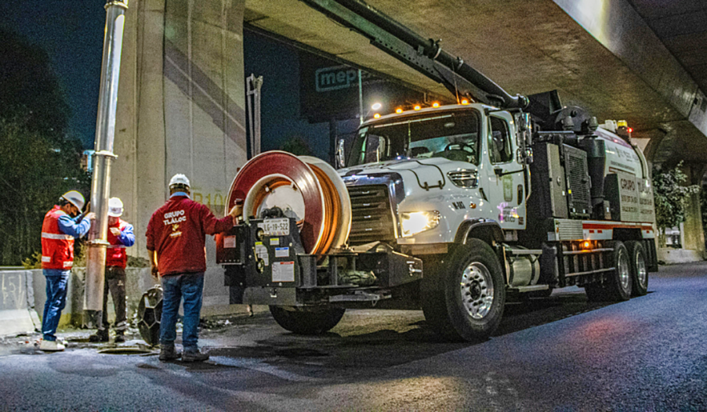Industrial vacuum loading truck removing waste