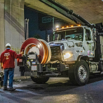 Industrial vacuum loading truck removing waste